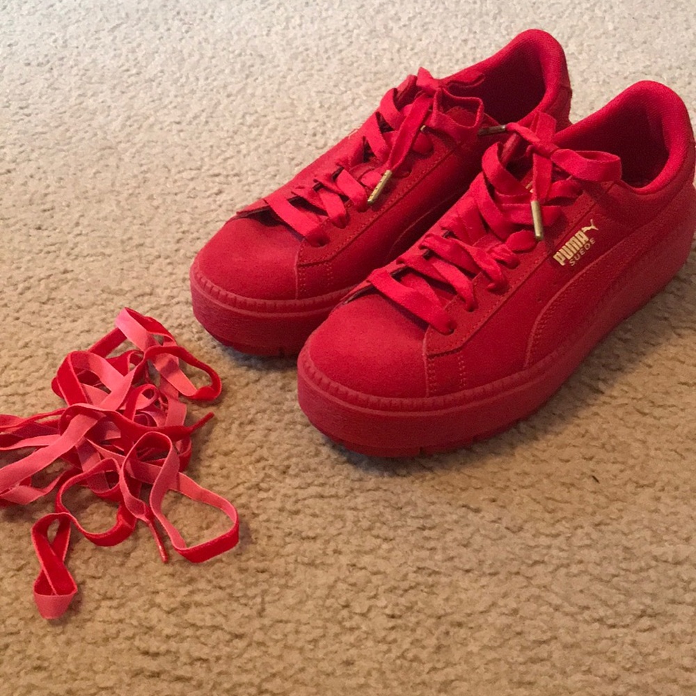 red Puma suede shoes